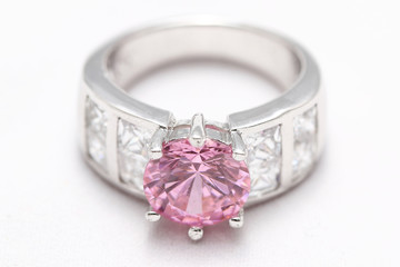 pink gem stone on diamond ring