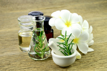 Obraz na płótnie Canvas Rosemary and essential oil for homeopathy remedy.
