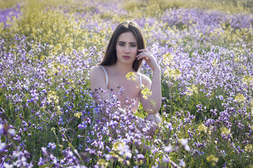 .Girl in a pretty looking flower field
