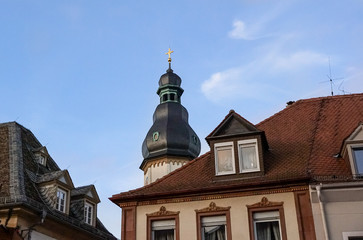 Fototapeta na wymiar Cross on top of the church on the blue sky background.