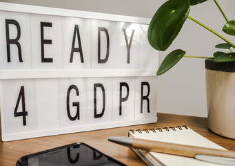 Ready for GDPR lightbox on a wooden table with accessories