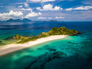 Fototapeta premium Aerial drone view of a deserted tropical sandy beach and clear ocean (Nacpan Beach)