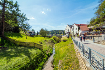 A view to Kurort Rathen houses, forest and Bastei mountains, Saxon Switzerland, Germany.