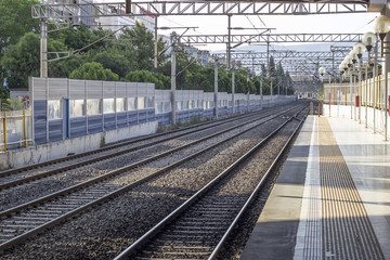 Fototapeta premium Perspective shot of empty railway line in turkey