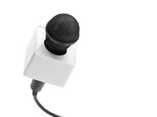 Close-up of black microphone isolated on white background