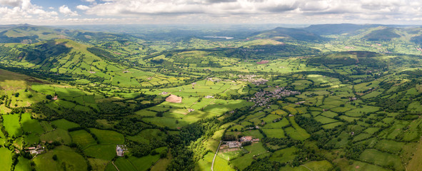 Panoramic aerial view of green farmland and fields in the rural Welsh countryside © whitcomberd