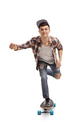 Naklejka premium Teenage skater riding a longboard