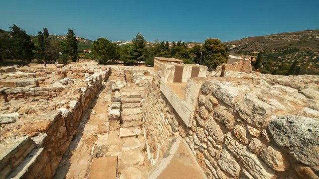 Ultra wide panning shot of the complex of the Minoan Palace of Knossos, Heraklion, Crete, Greece