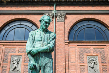 Fototapeta na wymiar urban scene with historical architecture and statue in copenhagen city, denmark