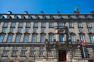 Fototapeta na wymiar urban scene with historical Christiansborg Palace in copenhagen, denmark