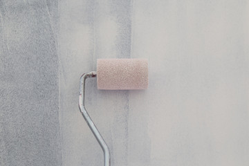 Painting of walls in a white color. Repair in a house.