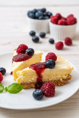 Homemade cheesecake with raspberries and blueberries