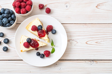 Homemade cheesecake with raspberries and blueberries