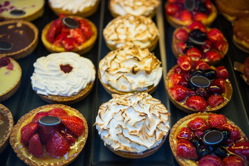 close up view of different tarts placed in rows