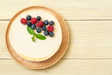 Homemade cheesecake with raspberries and blueberries