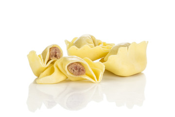 Tortellini Italian pasta stuffed with meat isolated on white background raw traditional.