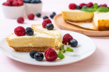 Homemade cheesecake with raspberries and blueberries