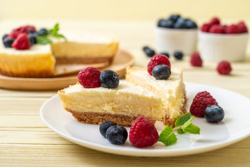 Homemade cheesecake with raspberries and blueberries
