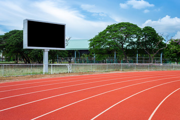 Digital blank scoreboard at football stadium with running track in sport stadium in outdoor...
