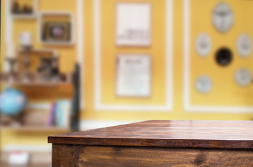 Selected focus empty brown wooden table and Coffee shop blur background with bokeh image. for your photomontage or product display