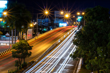 Beautiful scene of The color of Night traffic lights on the Road in Phitsanulok City, Thailand. June 1, 2018