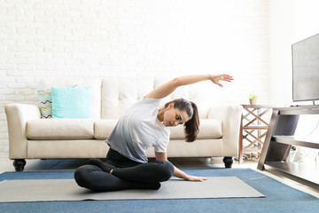 Woman bending and stretching sideways