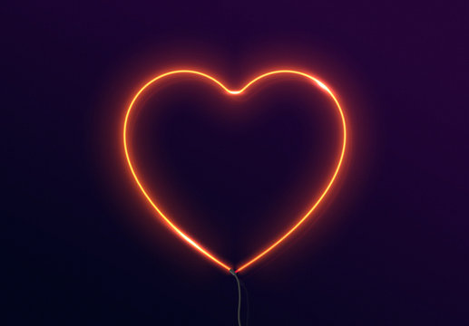 Happy Valentines Day on the background of neon light red heart