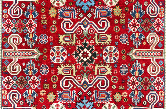 Oriental vintage handmade woolen carpet background