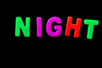 English letters in black background are the words night.