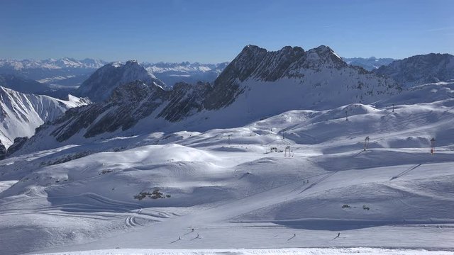 The lower part of the ski resort Zugspitze as seen from the Zugspitzplatt, central hub for all skiing lifts and the Zugspitz train glacier station.