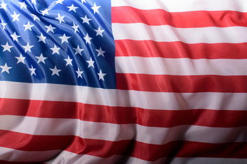 Obraz premium close-up shot of waving united states flag, Independence Day concept