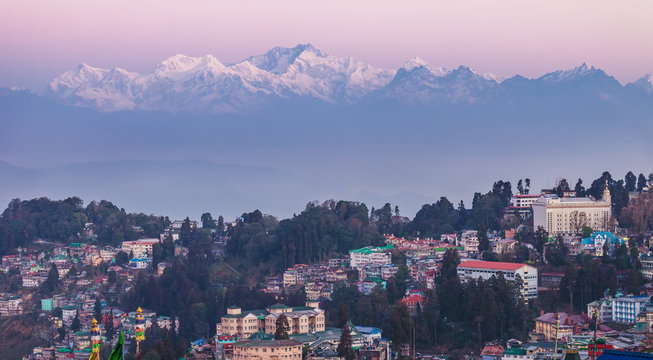View of a mountain ridge of Kanchendzhonga in the State of Sikkim, from the neighborhood of the city of Darjeeling, early in the morning, till the sunrise.