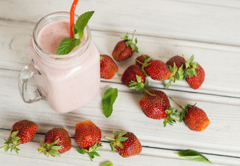 Healthy milk cocktail with strawberries