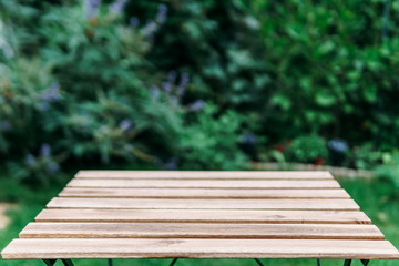 Fototapeta premium Empty Wooden Table In Garden