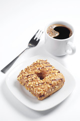 Donut with a caramel glaze and coffee