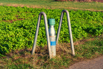 Peil tube, groundwater collection site on a field.