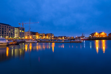 View of the marina and port in Bodo at night. Norway. Skyline of city.