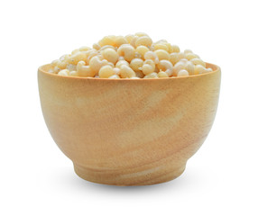 Subterranean ant eggs in wooden bolw  isolated on white background