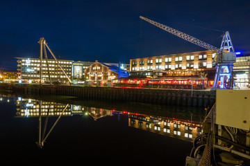 View of the marina and port in Trondhemi at night. Norway. Skyline of city. 
