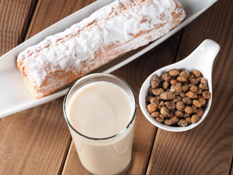 Horchata is a drink, made with the juice of tigernuts and sugar.  Native from Valencia &ndash; Spain, it is a refreshing drink, often accompanied with long thin buns called  fartons.
