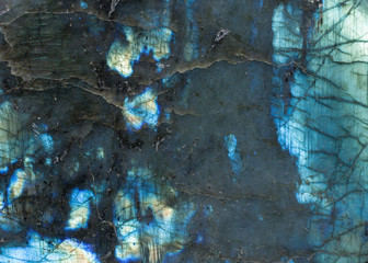 Labradorite surface showing blue color and texture 