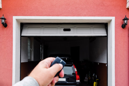 Garage Door PVC. Hand Use Remote Controller For Closing And Opening Garage Door.