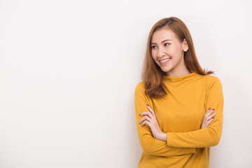 Fototapeta premium Smiling woman with crossed arms. Portrait isolated on white background.