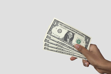 Hand with dollars isolated on a white background