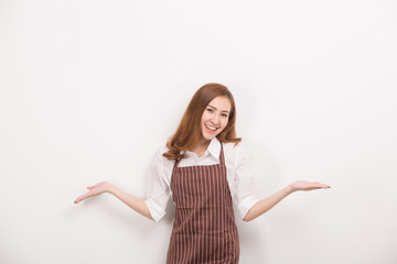 Beautiful happy young woman wearing kitchen apron , isolated on white