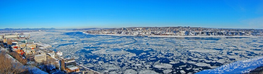 Levis City skyline panorama in winter. Levis is located on the south bank of St. Lawrence River,...