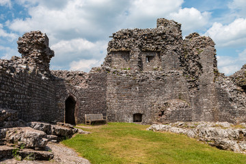 Inside the courtyard and walls of a ruined medieval castle (Carreg Cennen Castle)