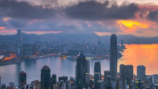 4k timel;aspe day to night sunrise scene of hongkong cityscape view from victoria peak, hongkong