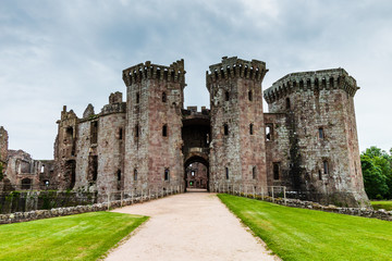 Fototapeta na wymiar Main entrance to the ruins of medieval Raglan Castle in Wales