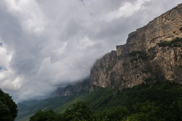 Fototapeta na wymiar Clouds over mountains